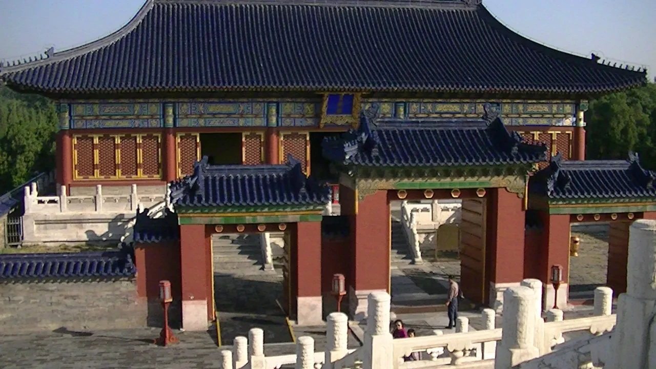 Traditional Chinese temple with ornate blue tile roof