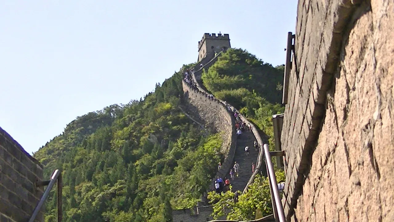 Visitors climbing the Great Wall steps