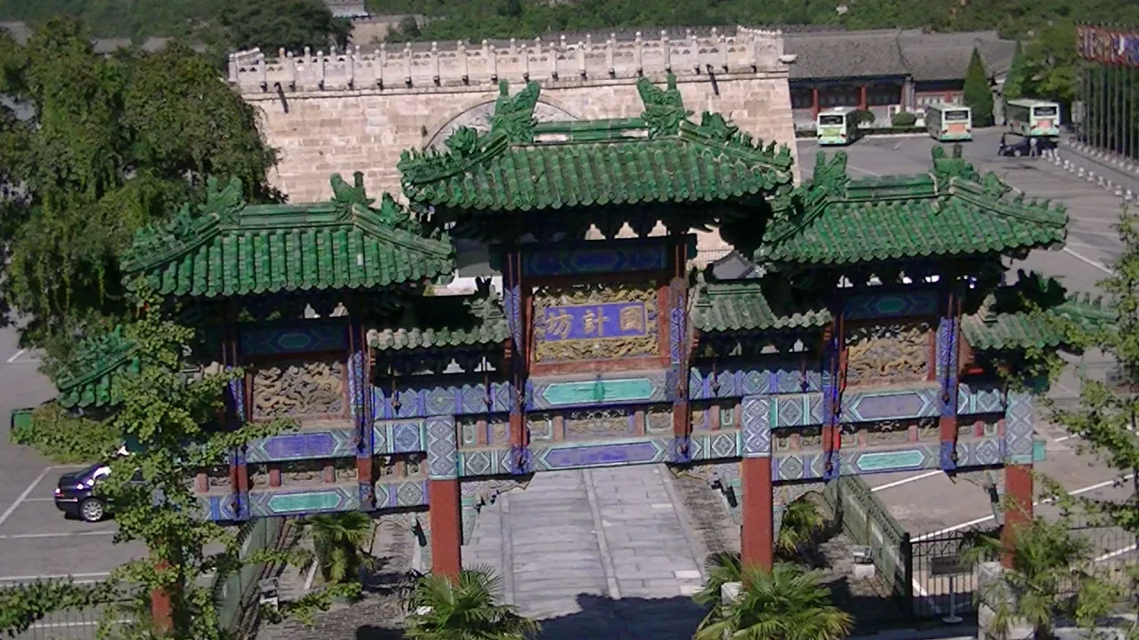 Ornate Chinese gate pavilion with green glazed tiles